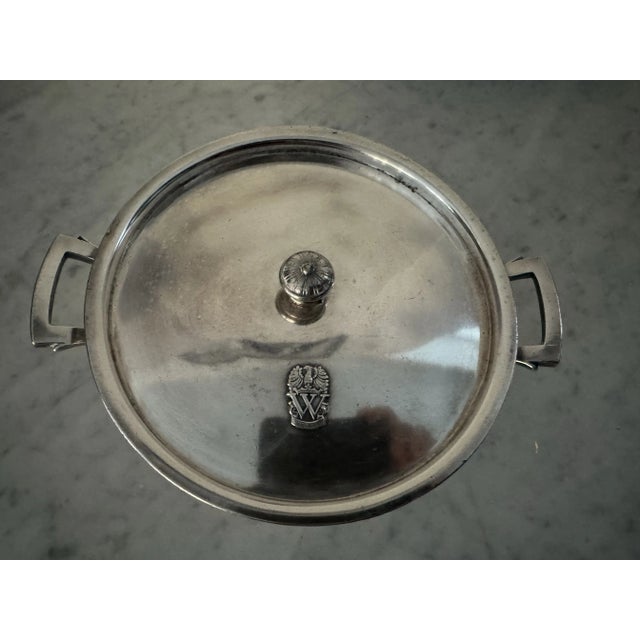 Handsome hotel silver covered pot from Whyte’s restaurant, London. The Whyte’s logo on lid; signed on underside of pot.