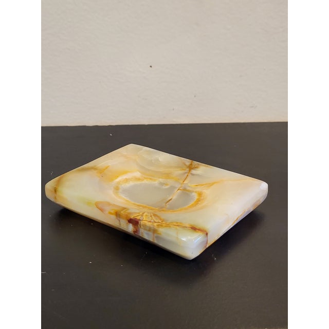 A lovely vintage onyx dish that would be great for holding your favorite items! Examples such as soap in a bathroom,...