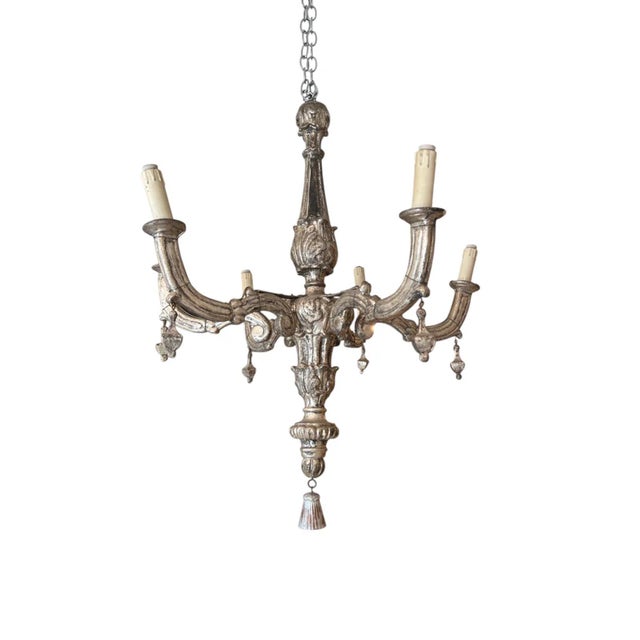 A stunning example of Italian craftsmanship, this 18th-century chandelier features six elegantly curved arms finished in...