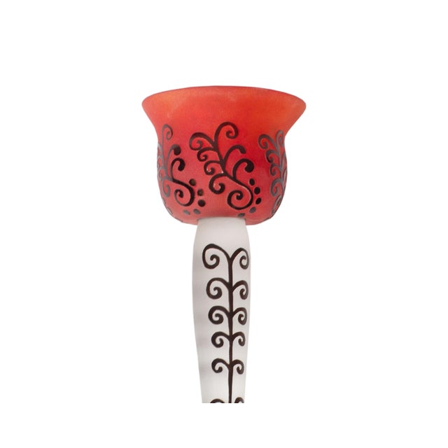 An art glass flower sculpture by the American glass artists Stephen Fellerman and Clair Raabe. This whimsical work...