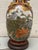 Vintage Japanese porcelain vase lamp, likely from the mid-20th century. The vase showcases a classic Japanese design with...
