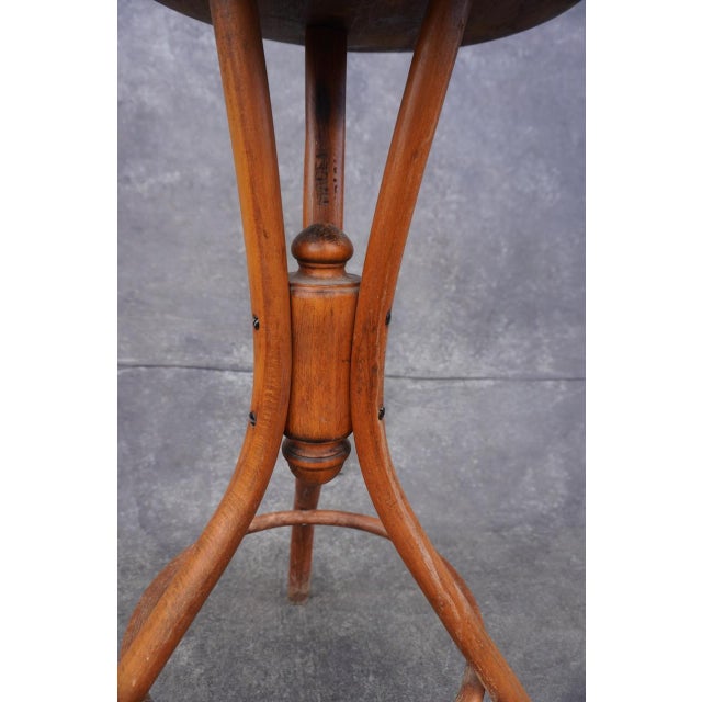 Thonet-style plant stand. Simple and elegant. Measures 30 3/4" high, diameter at the base 15", and the plant dish is 11...