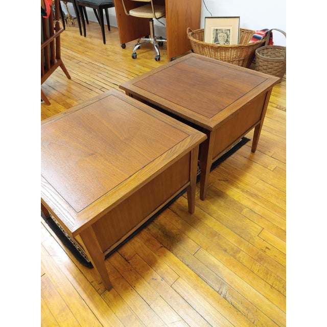 Here's a fine pair of end tables circa 1960s that look similar to Lane's Perception Line. They are very well made of solid...