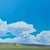 Kenosha Skies by Michael Magrin | Oil on linen Landscape with blue sky and clouds For Sale