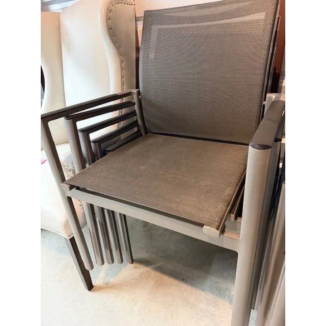 Gloster’s contemporary outdoor armchairs with taut mesh (sling) seats and backs. Powder-coated aluminum frame in a soft...