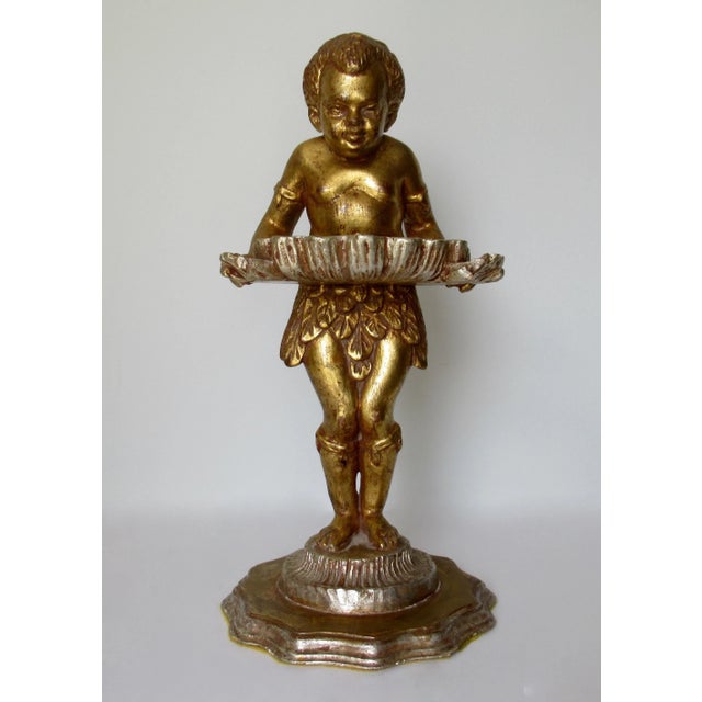 Vintage; C. Late 1950s-60s, Hollywood Regency era, is this Venetian Italian wood carved, figurine in a gilt silver & gold...