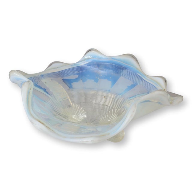 This Vintage Northwood Klondyke Opalescent Glass Footed Bowl is a striking example of early 20th-century craftsmanship....