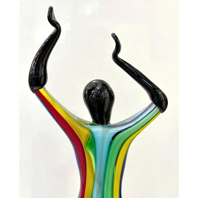 These captivating Murano glass sculptures, signed Formia Vetri di Murano Glass Made in Italy, depict a graceful trio of...