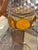 Lovely French brass ormolu and amber glass round jewelry casket box having ornate feet and circular glass panels around...
