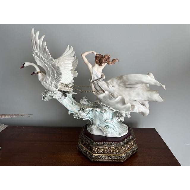Crafted by the renowned Giuseppe Armani, "The Triumph of Venus" sculpture stands as a testament to the timeless allure and...
