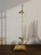 Substantial adjustable tabletop art easel sourced at Round Top, Texas. Crafted in a polished brass-finish metal, the stand...