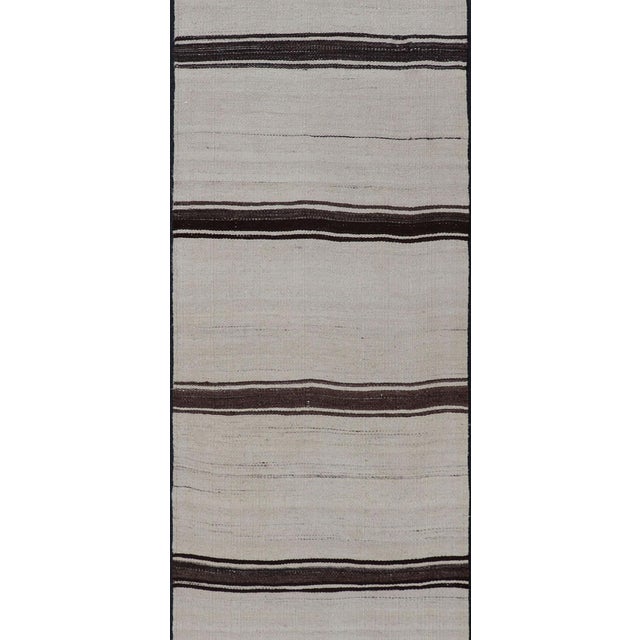 Measures: 2'0 x 7'10 Vintage Turkish Kilim Small Runner with Ivory and Dark Brown Stripes. Keivan Woven Arts /...