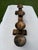 Hand-forged Mexican iron five-light candelabra featuring scrolling wrought iron construction and a richly textured crackle...