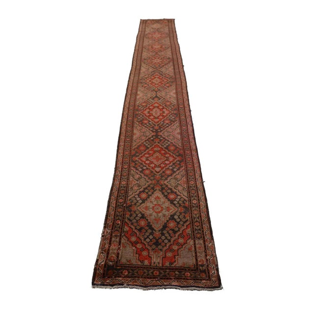 Make a statement with this Rare Vintage Samarkand Khotan Runner Rug. This stunning piece effortlessly blends timeless...