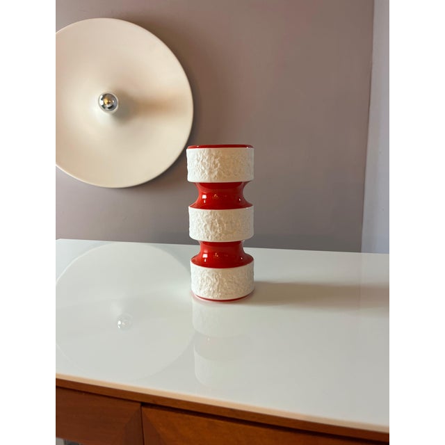 The 635/2 vase in red and black by Royal Porzellan Bavaria, produced for the Imperial Porcelain Manufactory KPM, is an...