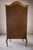 Rococo Vintage French Rococo Copper-Gilt Bow Front Tall Curio Cabinet With Mirrored Back For Sale - Image 3 of 11