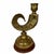 Vntage brass ram's horn candlestick, often associated with Hollywood Regency style. It features a distinctive curved,...