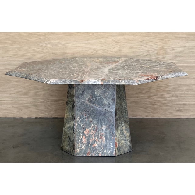 Absolutely gorgeous octogonal marble coffee or cocktail table from the 1970s, in fantastic, virtually unused condition....