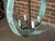 A Midcentury English copper double ring light fixture with four lights and verdigris patina, professionally rewired for...