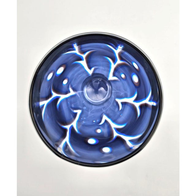 This exquisite vintage studio glass piece is a stunning example of Scandinavian mid-century craftsmanship, designed by the...