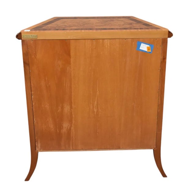 The Art Deco Italian One Door Walnut Cupboard is a handmade antique piece from the 1960s, crafted in Italy. This Art Deco...