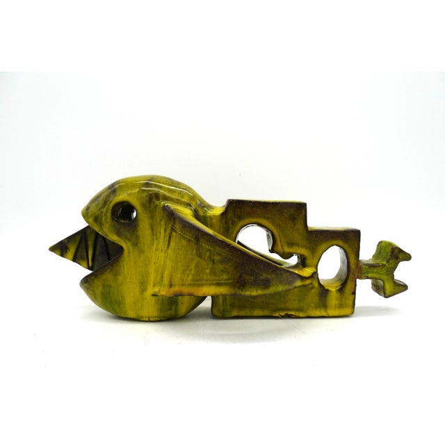 Tail looks restored but it isn't. It is his original condition (was made from two pieces). Small glaze flake at the base