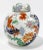 Elegant rich tones of blue, orange and green floral pattern on a white background to this vintage lidded ginger jar....