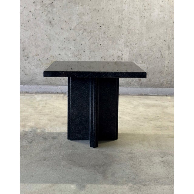 Meet the Postmodern Brutalist Granite Side Table. This striking piece combines raw, industrial power with an avant-garde...