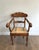 This very fine and elegant desk chair with swan neck decorations is made of carved wood. It is an English work from the...