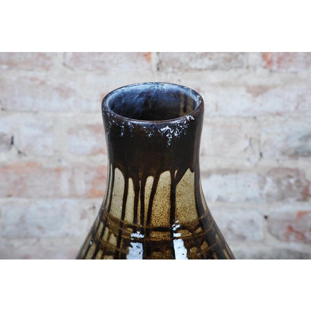 This original ceramic vase originates from 1950s Czechoslovakia and stylistically falls into the Mid-Century period. Its...