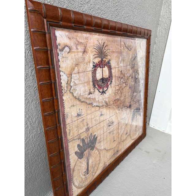 A handsome vintage decorative map print published by Winn Devon, titled "Nova Totius," beautifully framed in a rich faux...
