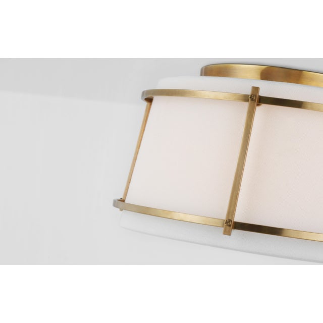 Callaway Small Flush Mount in Hand-Rubbed Antique Brass with Linen Shade and Frosted Acrylic Diffuser Designer: Carrier...