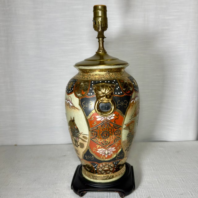 Steeped in rich detail and layered with exotic history, this exquisite mid-century Chinoiserie table lamp brings an air of...