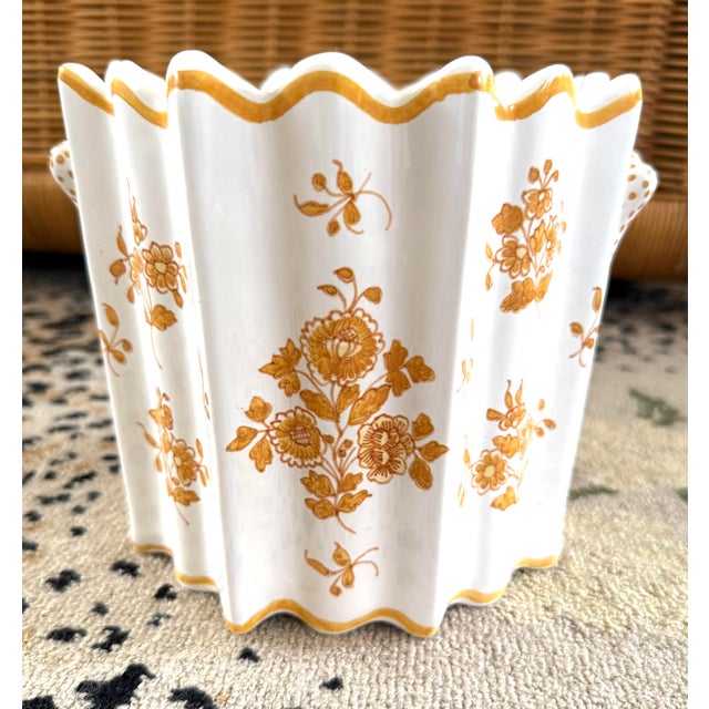 Hand painted in France for Tiffany & Co. French faience wine holder or cachepot. Fluted sides. Flowers in deep yellow.