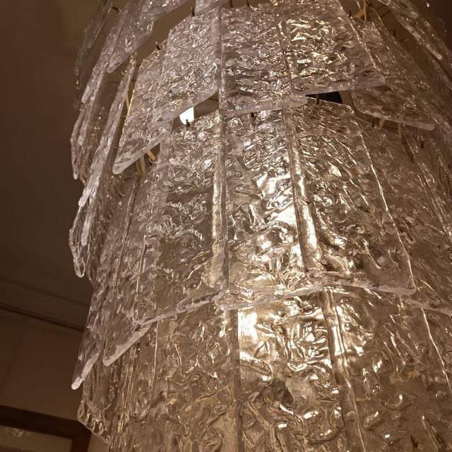 Magnificent large piece of lighting. It is a cascade or staircase lamp composed of a multitude of individual pieces with a...