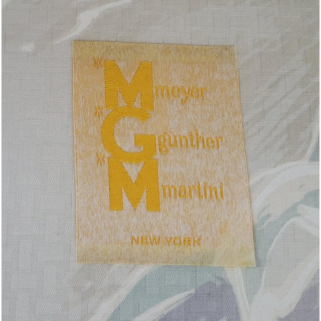 Elegant pair of French Louis XV style settees by Meyer Gunther Martini of New York. Each are handmade and done is a light...