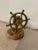 A fab little brass nutcracker in the shape of a ship’s wheel set atop a wooden base. Lovely detail. Hand selected in and...
