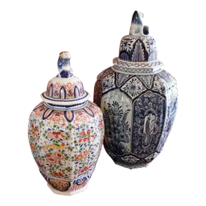Duo of Delftware Covered Jars Topped by Lion Finials