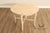 Decorative Round Accent Table Featuring a Beige Marble Top Raised on a Hand Carved Faux Bois Style Wooden Base. The Base...