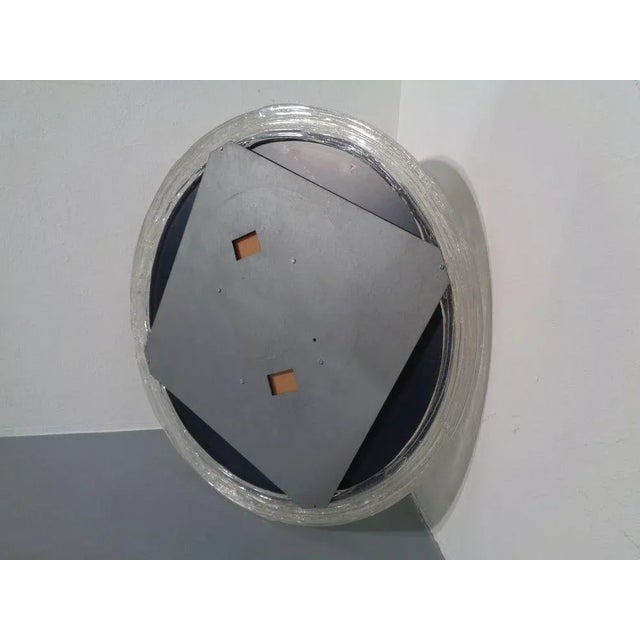 Large round mirror with Acrylic Glass frame.