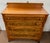 Nice mid 19th century Empire chest of drawers made of cherry with flame mahogany veneer drawer fronts. Drawers are all...