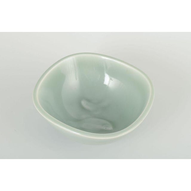 Nils Thorsson Royal Copenhagen. Bowl, model 4204, 1940s. Thrown stoneware bowl with elegant celadon glaze in soft green...
