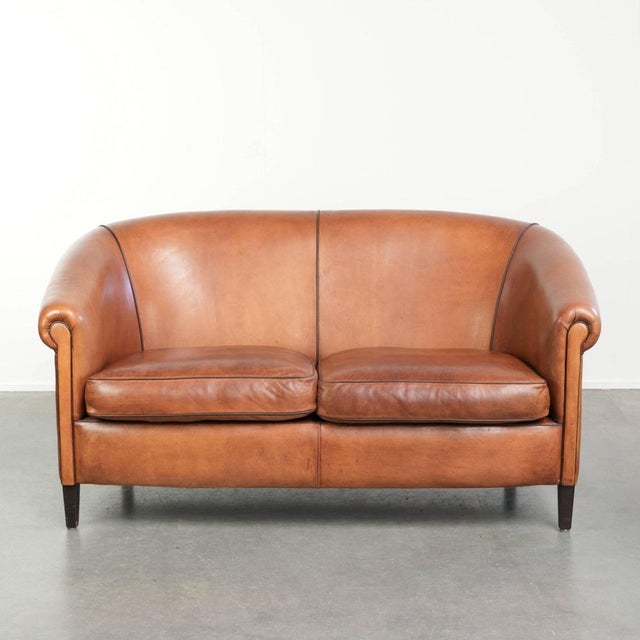 Sheepskin 2-Seater Sofa with Warm Cognac Brown Color Scheme and Finish with Black Piping For Sale - Image 15 of 15