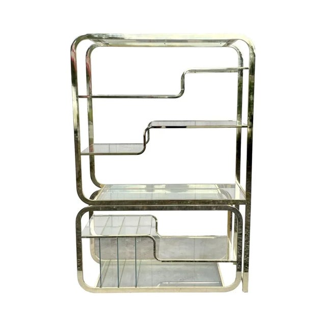 Stunning two-piece brass etagere by Design Institute of America. Inspired by Milo Baughman’s designs this piece features...