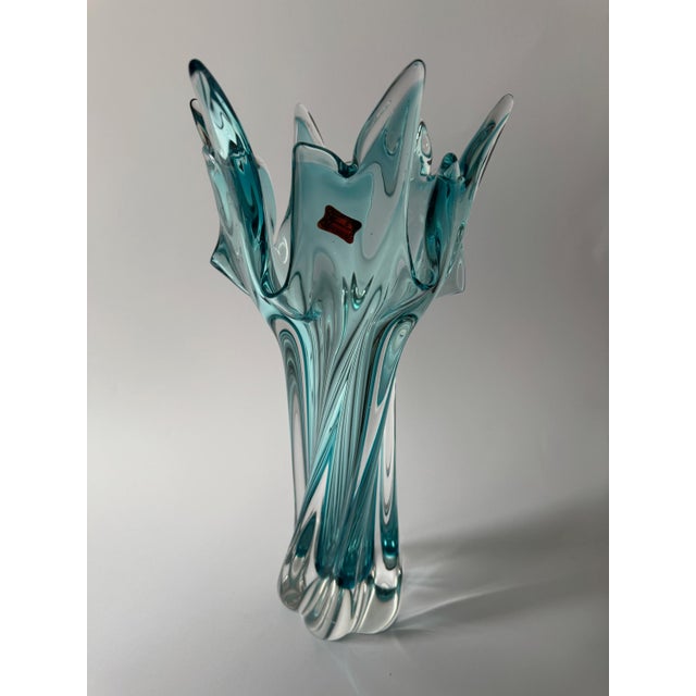 A large sculptural Czech art glass vase that reads almost like a glass sculpture rather than a traditional vessel. A...