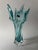 A large sculptural Czech art glass vase that reads almost like a glass sculpture rather than a traditional vessel. A...