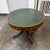 Design Plus Gallery presents a Mid 19th Century Round Leather Top Pedestal Table by Manor House Furniture Works Ltd. The...