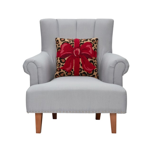 The Leopard & Red Bow Pillows A 100% wool hooked square pillow with poly velvet backing. It includes polyester insert,...