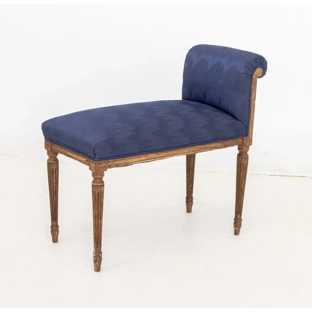 Pair of Louis XVI Style Navy Blue Upholstered Window Seats, each with one scroll arm atop fluted legs. 27" H x 30" W x 13"...