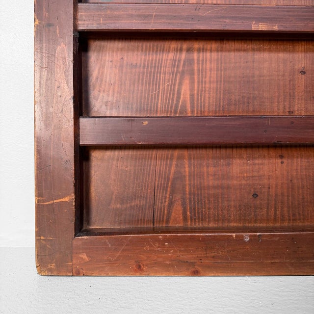This original Japanese door panel features a strong, rhythmic structure: a wide wooden frame with multiple horizontal...